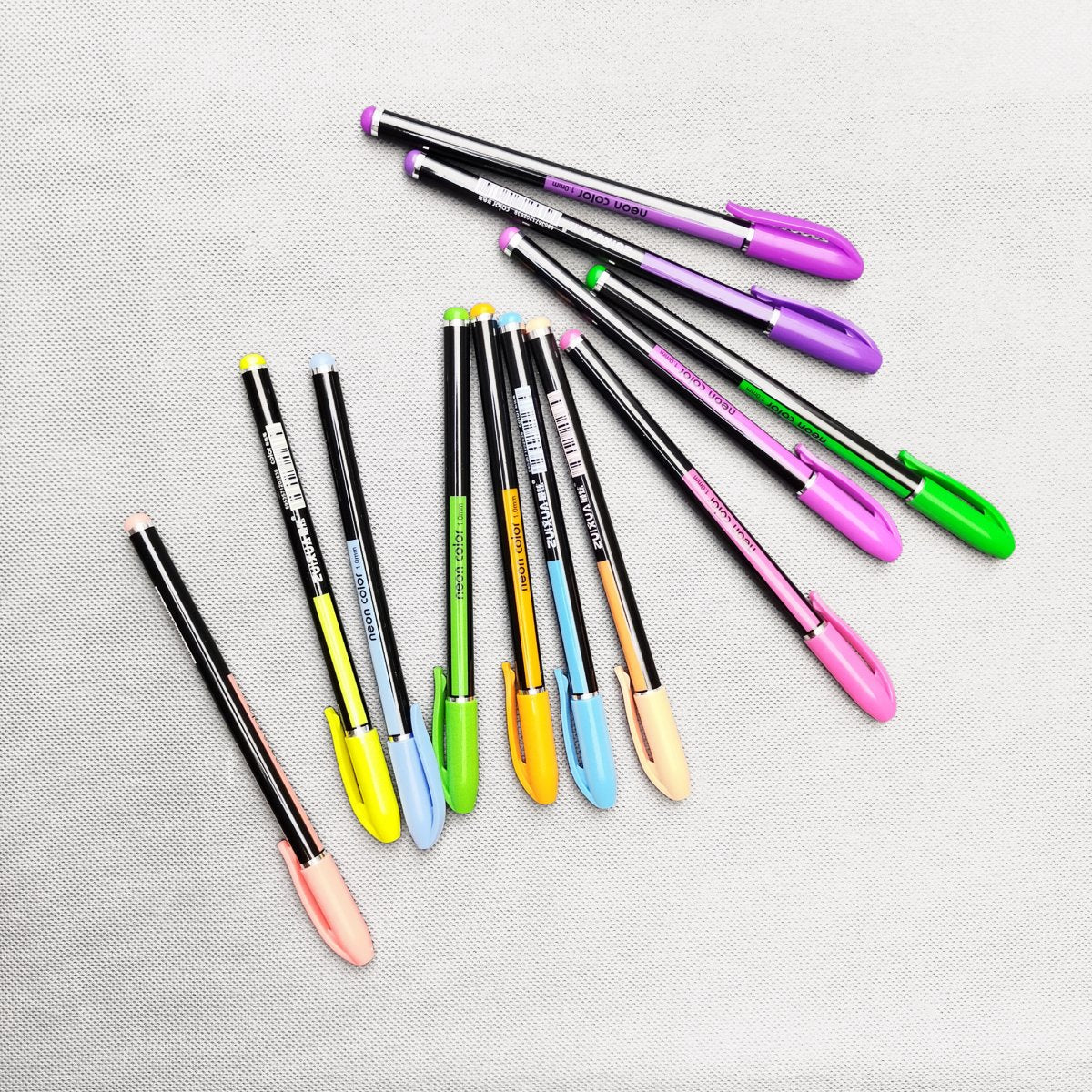 12-osaline neoonmarkerite komplekt erksate värvidega