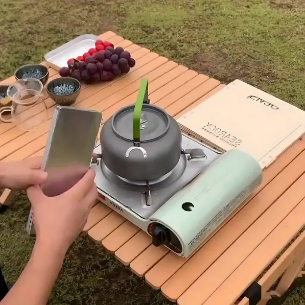 Tuulekindel kokkupandav põletiga pliidi eraldaja